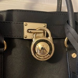 Michael Kors, black, “Hamilton Tote” in NEW USED condition.
